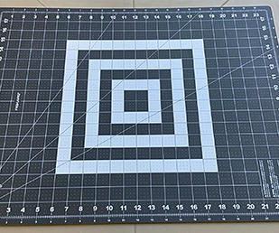 Use a clean calibrated mat or a clean background (plastic or vinyl).