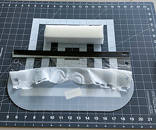 Cut a piece of high-density foam 2 x 2 x 8 inches.